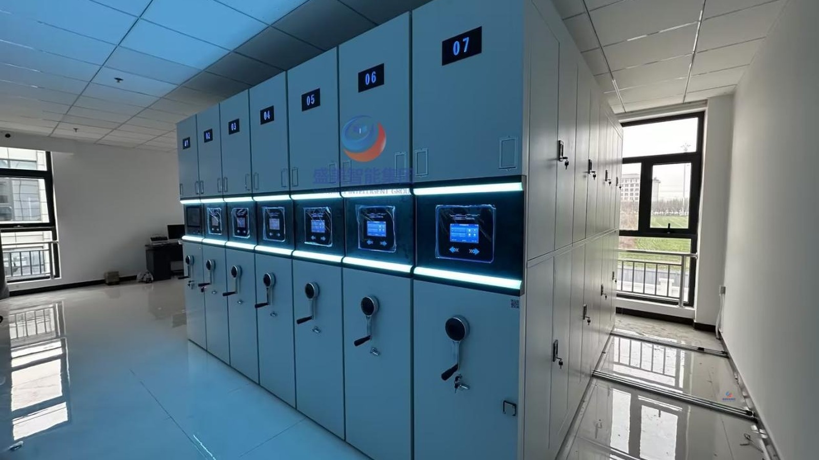 Close-up of the intelligent touchscreen control panel on a smart compact shelving unit.